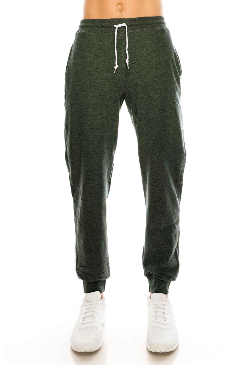 French Terry Charcoal Grey Fleece Pants: Cozy fleece bottoms for easy, warm, and functional wear. 60/40 Cotton/Poly blend, elastic waist/ankle, side pockets. Sizes 2XL-5XL, colors: Black, Heather Grey, Charcoal, Wood Camo, City Camo. 